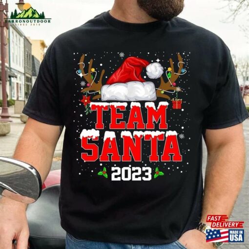 Team Santa 2023 Christmas Shirt Matching Family Reindeer Lights Unisex Hoodie