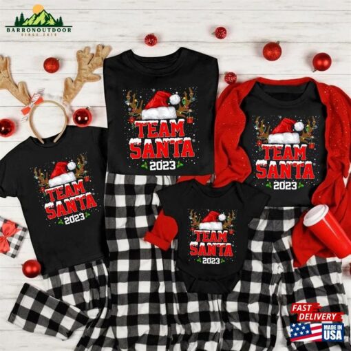 Team Santa 2023 Christmas Shirt Matching Family Reindeer Lights Unisex Hoodie