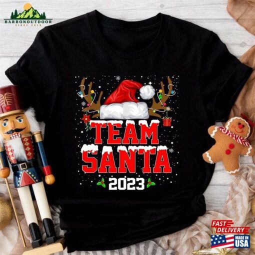 Team Santa 2023 Christmas Shirt Matching Family Reindeer Lights Unisex Hoodie