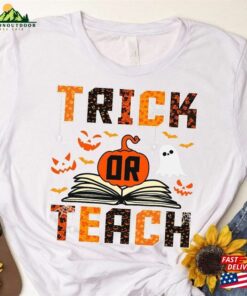 Trick Or Teach Cute Halloween Teacher Happy 2023 T-Shirt Back To School Shirt Sweatshirt Unisex