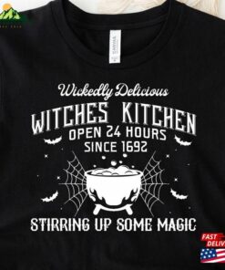 Wickedly Delicious Witches Kitchen Open 24 Hours Since 1692 Stirring Up Some Magic Shirt Funny Halloween Tee Hoodie Unisex